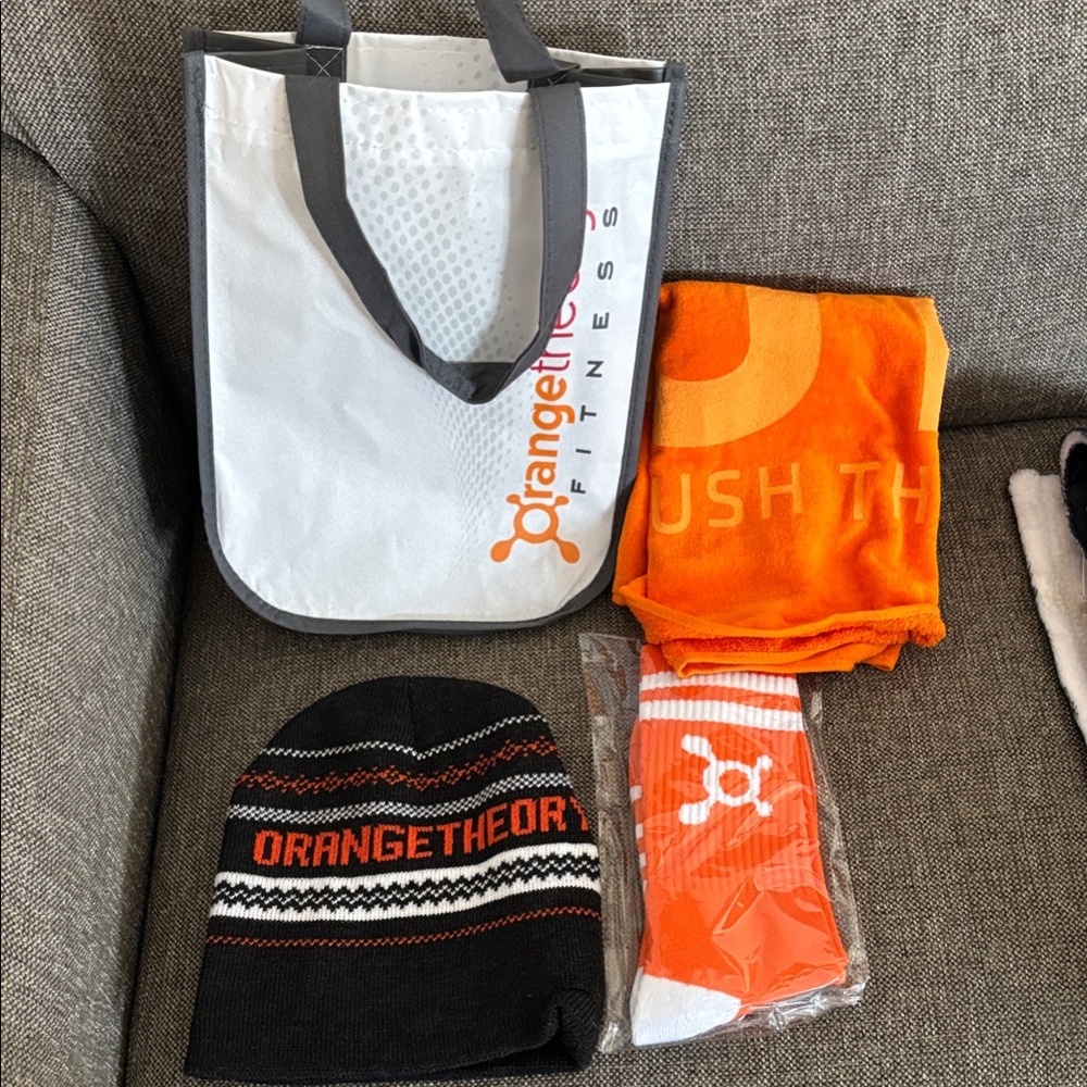Orangetheory Black and Orange Knit Beanie Includes socks, towel and bag.
